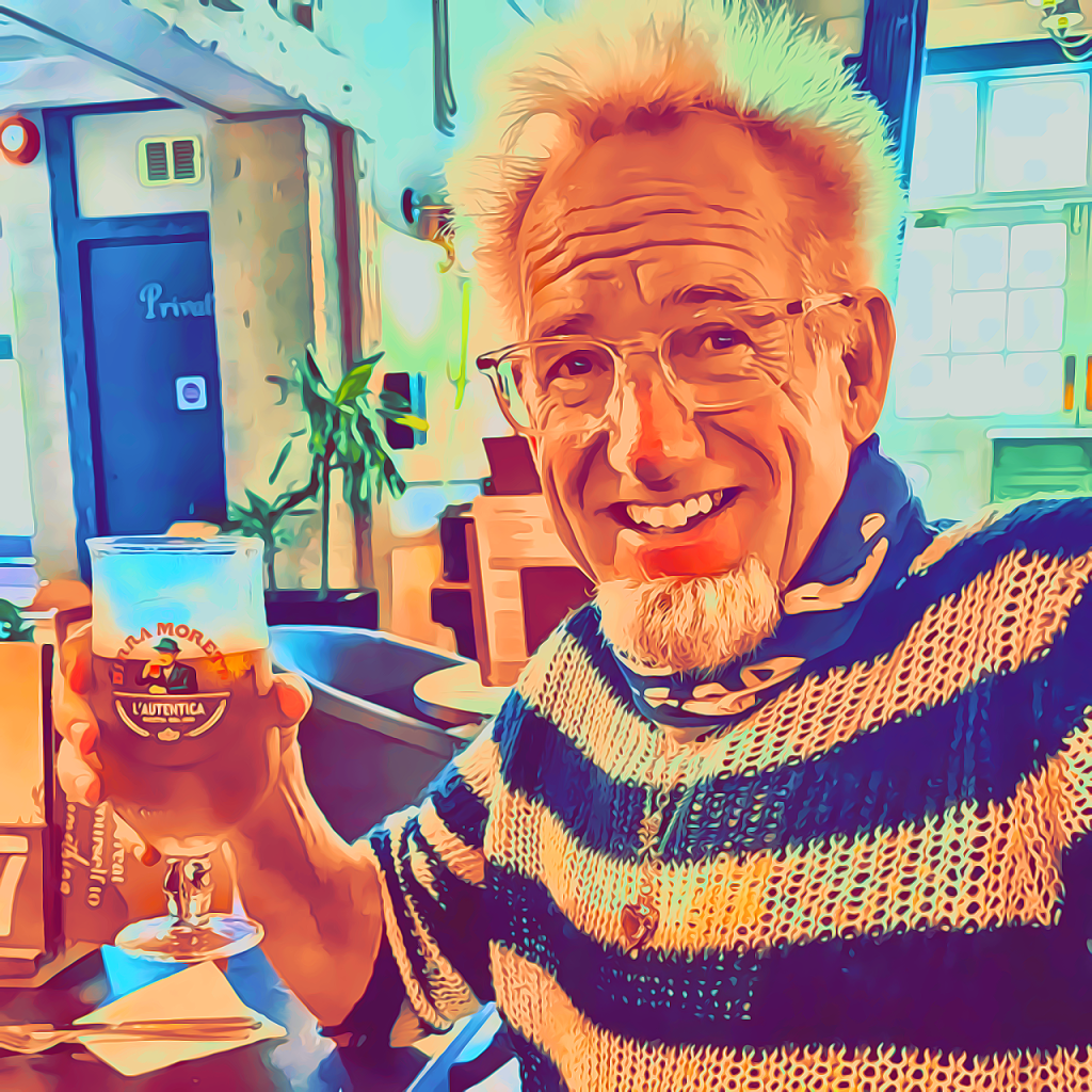Dave the Punk cartoon in a stripy jumper, blonde hair, pint in hand