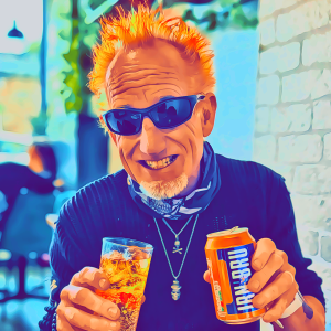 Dave the Punk smiling with an Irn-Bru can matching his bright orange hair, before Scotland Calling festival in Glasgow
