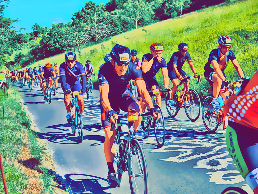 Cyclists ascending Box Hill during Ride London