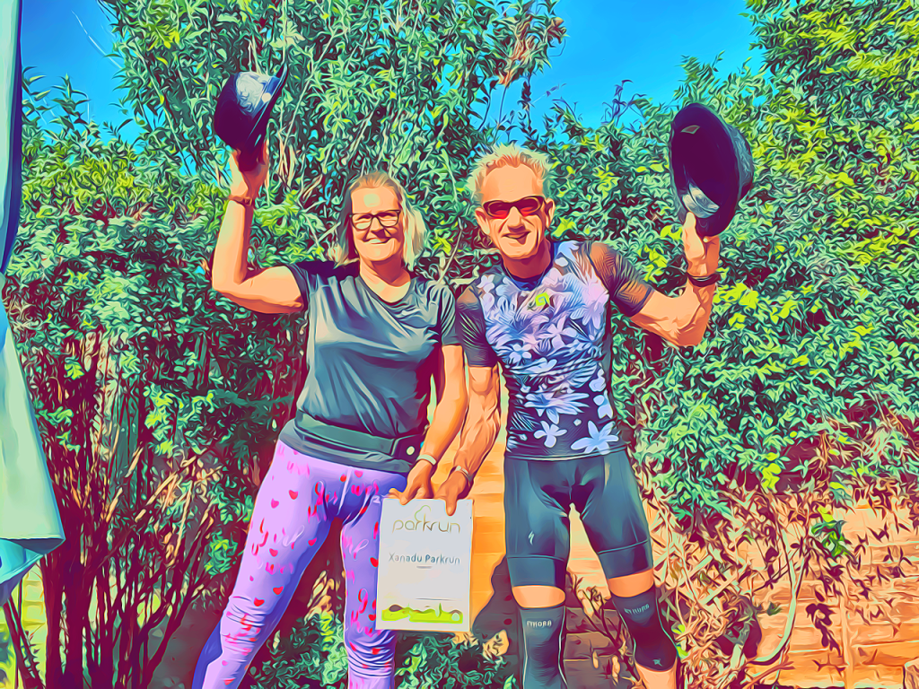 Polly and Dave with props from a lockdown parkrun video